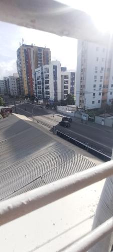 a view of a city with tall buildings at Qto privativo em Duplex a 5km do carnaval in Olinda