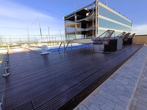 Balkón nebo terasa v ubytování Basento Deluxe Apartment with parking pool gym padel