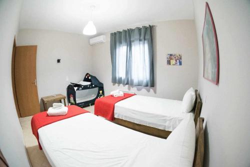 Una cama o camas en una habitación de mirmidones Anesis