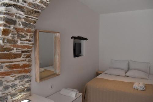 Katil atau katil-katil dalam bilik di Chora Cozy Studios - Kythnos