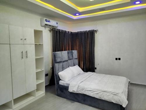 เตียงในห้องที่ Soulshine Apartment
