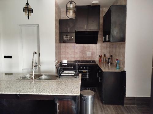 ครัวหรือมุมครัวของ Soulshine Apartment
