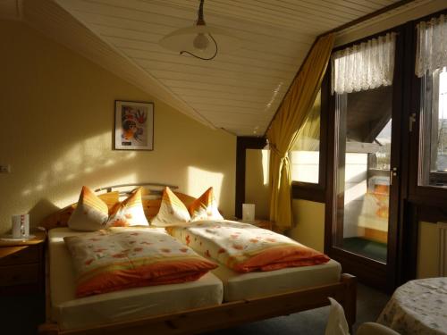 Postel nebo postele na pokoji v ubytování Haus Reitz
