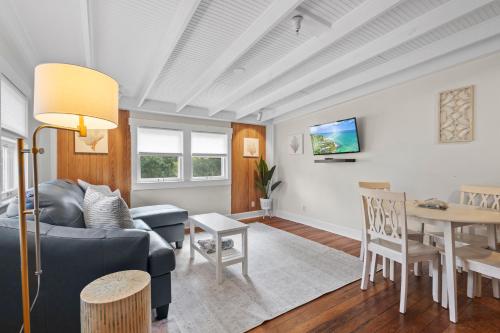 a living room with a couch and a table at The Old Apartment in Fort Pierce