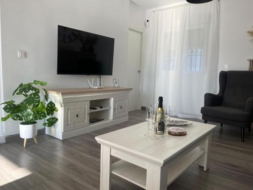 TV a/nebo společenská místnost v ubytování Casa Alpha