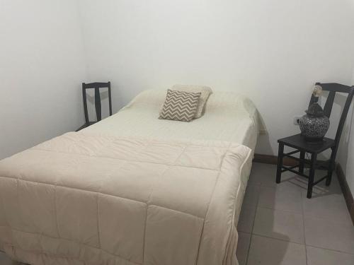 Ένα ή περισσότερα κρεβάτια σε δωμάτιο στο Casas Clara