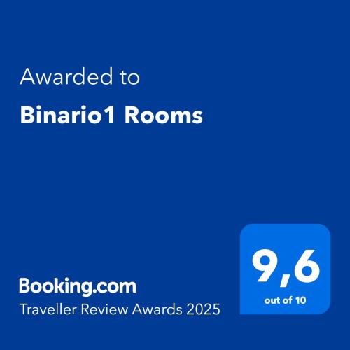 a blue sign with the text awarded to bimota rooms at Binario1 Rooms in Barletta