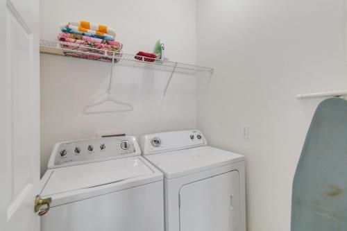 a kitchen with a white stove and a dishwasher at Huge Screened Patio That Overlooks Lake Buck, Near Famous Attractions!! in Orlando