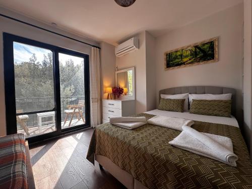 Katil atau katil-katil dalam bilik di Villa Carian Trail evdatca - Datca Kargi Bay, Close to Beach