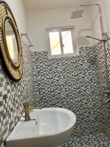 Ένα μπάνιο στο Dos Marias Tourist Inn Malapascua