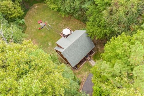 an overhead view of a house in the woods at Retrievers Retreat High Tech Log Cabin Oasis in Berkeley Springs
