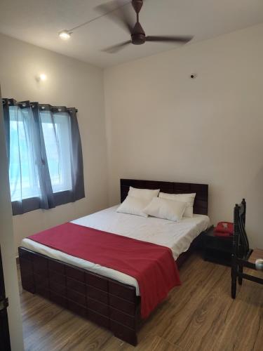 Cama o camas de una habitación en Sri Adhinath Residency