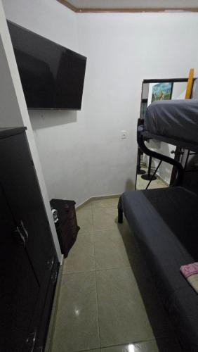 Televisyen dan/atau pusat hiburan di Apartamento Estadio 1