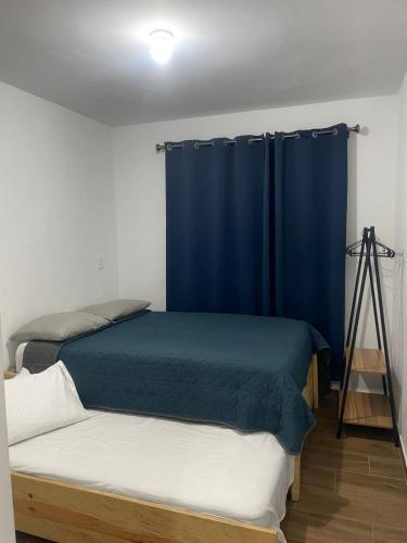 Postel nebo postele na pokoji v ubytování Departamento Altata punta paraiso