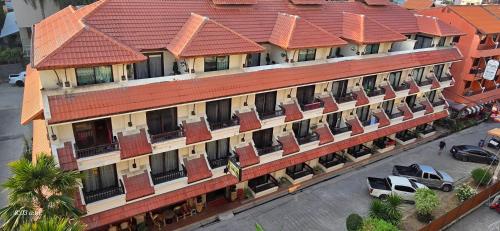 an overhead view of a large building with red roofs at Nirvana Boutique Suites in Jomtien Beach