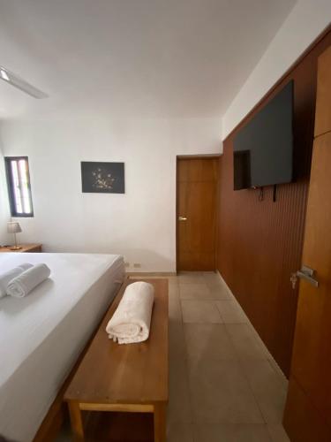 Llit o llits en una habitació de Mila's House