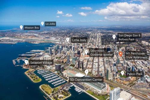an aerial view of the city of sydney with buildings at New York Style Penthouse in the heart of the city in San Diego