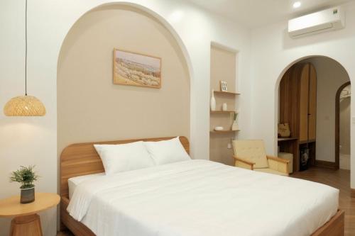 Ένα ή περισσότερα κρεβάτια σε δωμάτιο στο Mê Stay Cat Ba