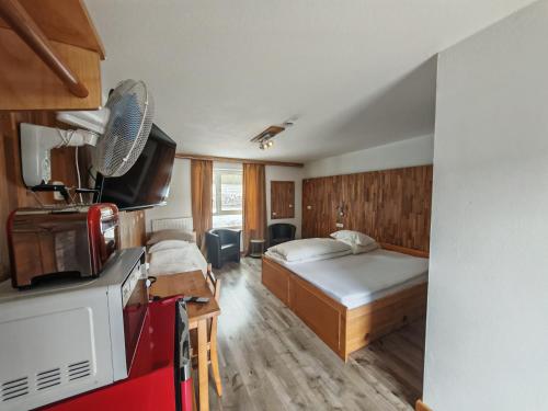 Kuchyň nebo kuchyňský kout v ubytování Max Motel
