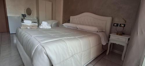 Ένα ή περισσότερα κρεβάτια σε δωμάτιο στο B&B Da Rocco