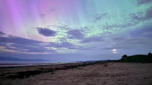 a view of a beach with a cloudy sky at West Coast Home From Home in Stevenston