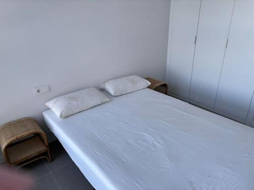 Ένα ή περισσότερα κρεβάτια σε δωμάτιο στο Appartement avec vue piscine