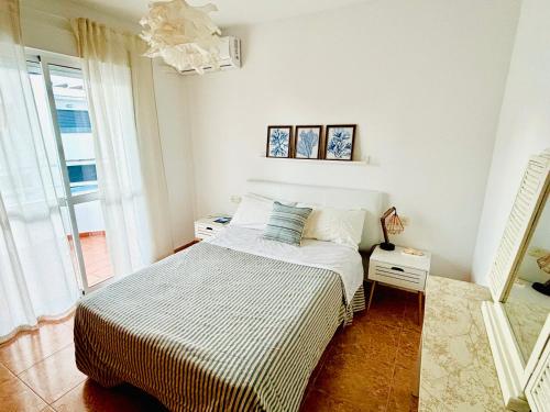Ένα ή περισσότερα κρεβάτια σε δωμάτιο στο Calma Marina San José