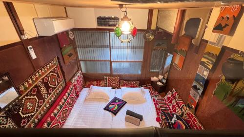 an overhead view of a bed in a room at Kyoto House in Yamazaki