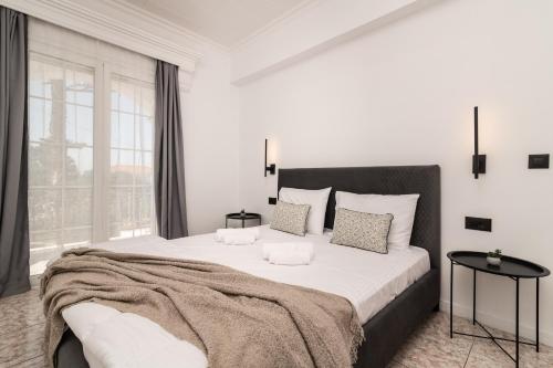 Cama o camas de una habitación en Villa Merlis