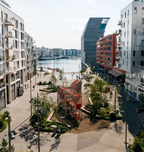 a view of a city with buildings and a body of water at Central Oslo Apartment with Private Balcony in Oslo
