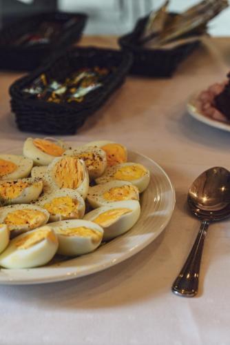 a plate of deviled eggs on a table at Hotel Promyk Wellness & Spa in Karpacz