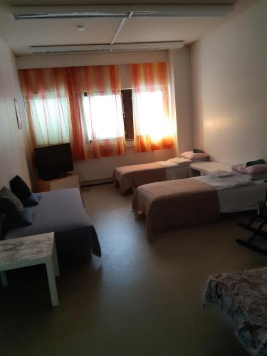 Katil atau katil-katil dalam bilik di Minimotel