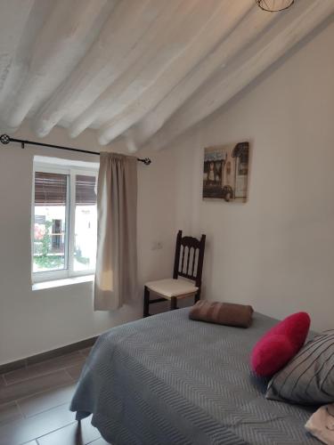 Postel nebo postele na pokoji v ubytování Casa Cueva