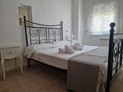 Кровать или кровати в номере Family Vacation Casita