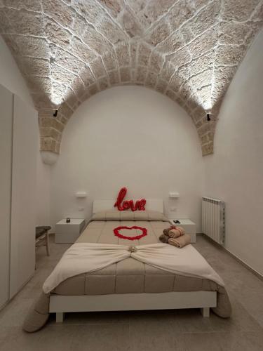 Postel nebo postele na pokoji v ubytování Dimora Suite 36