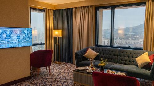 Televisyen dan/atau pusat hiburan di فندق الصفوة البرج الأول Al Safwah Hotel First Tower 1