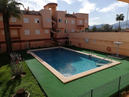Πισίνα στο ή κοντά στο Oasis Solo Familias Serviplaya