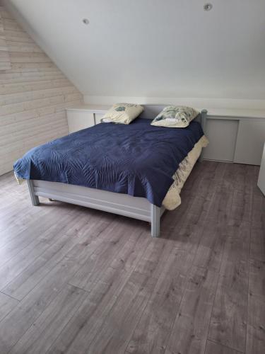 Ένα ή περισσότερα κρεβάτια σε δωμάτιο στο Chambres