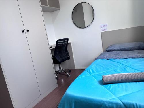 Ένα ή περισσότερα κρεβάτια σε δωμάτιο στο 2 Quartos com Ar Condicionado Apto Próx Hosp Paraná and HC