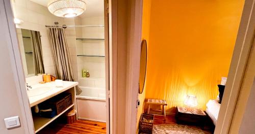 a bathroom with a sink and a mirror at Hypercenter - Wifi - In the heart of Avignon! in Avignon