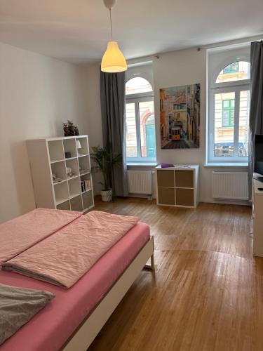 Postel nebo postele na pokoji v ubytování Ferienwohnung Henricistrasse
