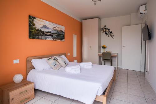 Ένα ή περισσότερα κρεβάτια σε δωμάτιο στο Girasole Suite Leonardo Academy, MXP & Lakes