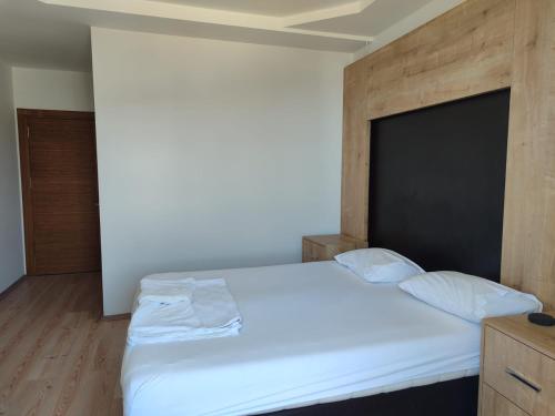 Katil atau katil-katil dalam bilik di HOTEL YAGMUR