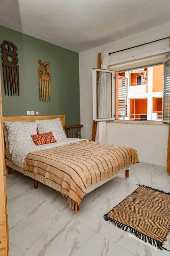 Llit o llits en una habitació de Confort home