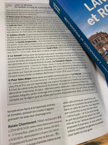 an open book with a blue bookmark on top of it at LaFabriek in Canet d'Aude