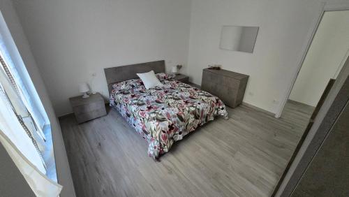 Voodi või voodid majutusasutuse La Casa di Nonna Mari toas