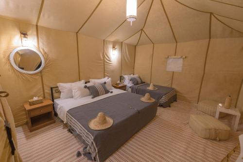 Postel nebo postele na pokoji v ubytování Luxury Trippers Camp