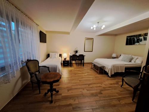 Postel nebo postele na pokoji v ubytování Apartamenty Avanti-Stare Miasto Zamość