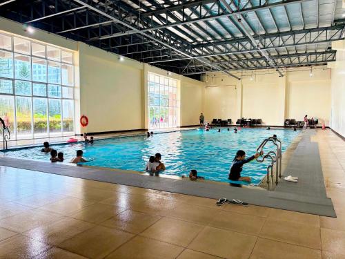 a group of people in a swimming pool at Casa Manawari in Tagaytay