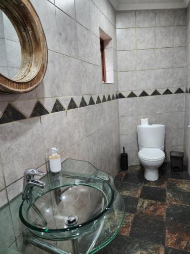 Ένα μπάνιο στο Goodnight Guest Lodge